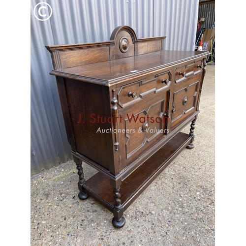 52 - An early 20th century oak sideboard