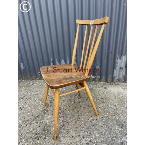 60 - An ercol stick back kitchen chair