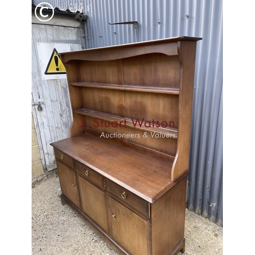 9 - A stag minstrel three drawer dresser