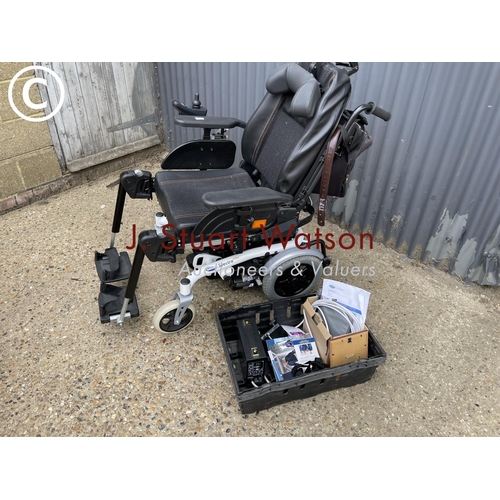 97 - A invacare spectra xr2 powered wheelchair with charger and accessories