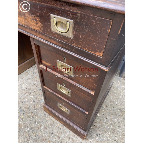 282 - A mahogany campaign style desk with military handles  122wide