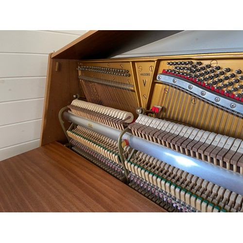 349 - Steinway Model V upright piano with a teak case. Made in Hamburg. Piano has an eighty-eight note key... 