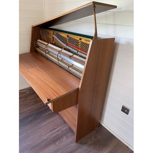 349 - Steinway Model V upright piano with a teak case. Made in Hamburg. Piano has an eighty-eight note key... 