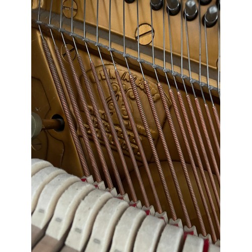 349 - Steinway Model V upright piano with a teak case. Made in Hamburg. Piano has an eighty-eight note key... 