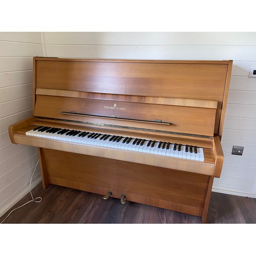 349 - Steinway Model V upright piano with a teak case. Made in Hamburg. Piano has an eighty-eight note key... 