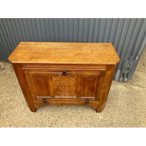 307 - An oak drop front sideboard