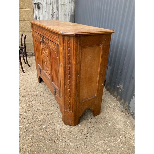 307 - An oak drop front sideboard