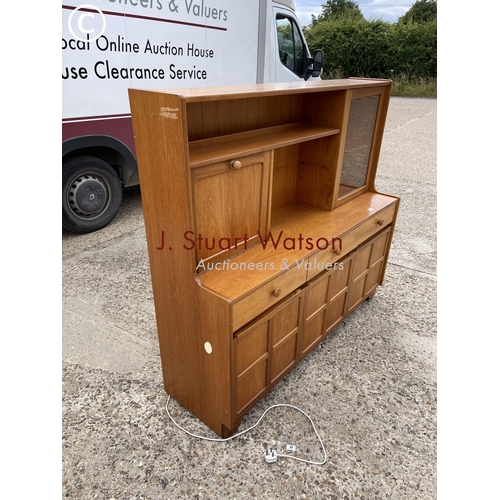 336 - A Nathan teak lounge unit with cocktail compartment front