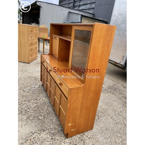 336 - A Nathan teak lounge unit with cocktail compartment front
