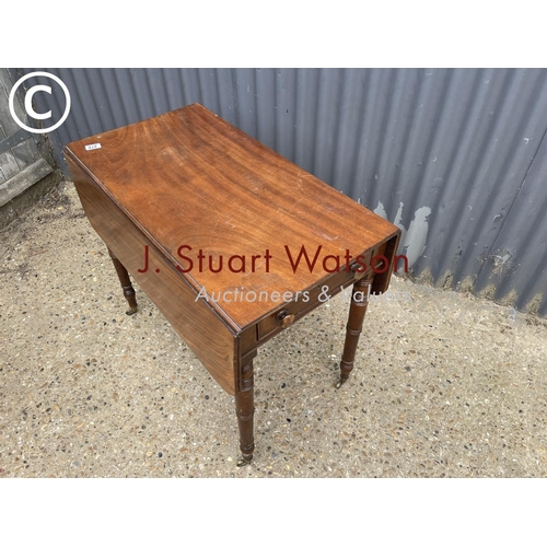 343 - A Victorian mahogany Pembroke table with one drawer and one dummy drawer