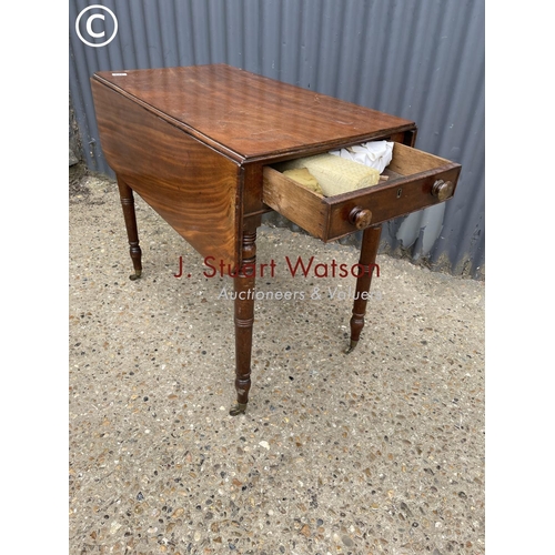 343 - A Victorian mahogany Pembroke table with one drawer and one dummy drawer