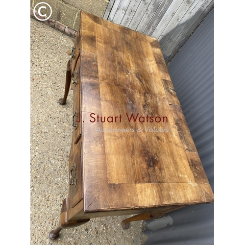 345 - An early walnut  three drawer lowboy table