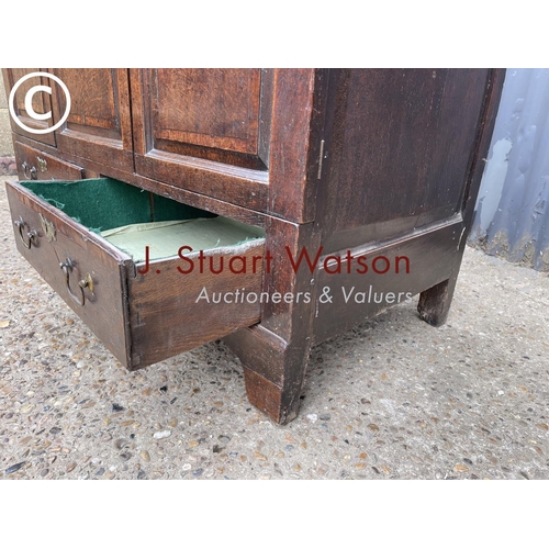 346 - A 18th century oak two drawer mule chest 133x56x88