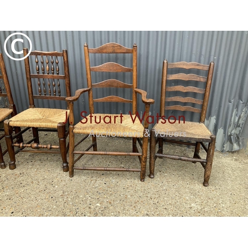 348 - Five assorted rush seat dining chairs including carver