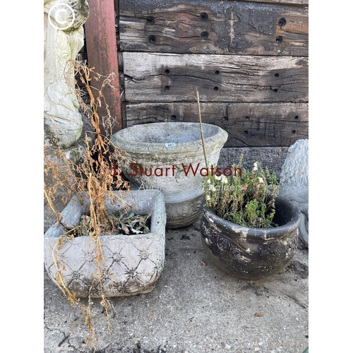490D - A large circular concrete planter together with two other smaller pots