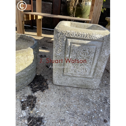 490E - A set of four circular concrete planters together with a square rose pattern planter