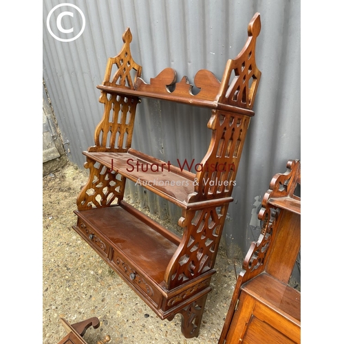 103 - Two ornate mahogany wall shelves together with two small wall cabinets