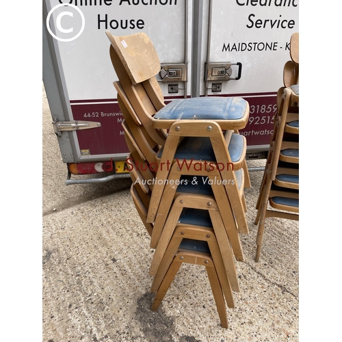 17 - A set of ten vintage bent ply stacking school chairs