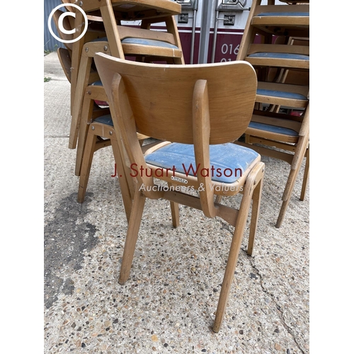 17 - A set of ten vintage bent ply stacking school chairs