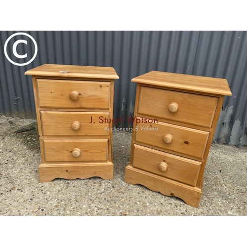 19 - A pair of solid pine three drawer bedsides