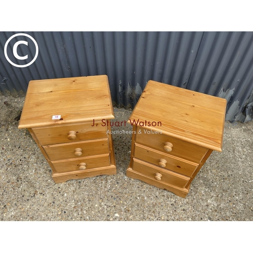 19 - A pair of solid pine three drawer bedsides