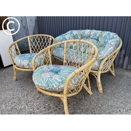 250 - A vintage bamboo three piece conservatory suite