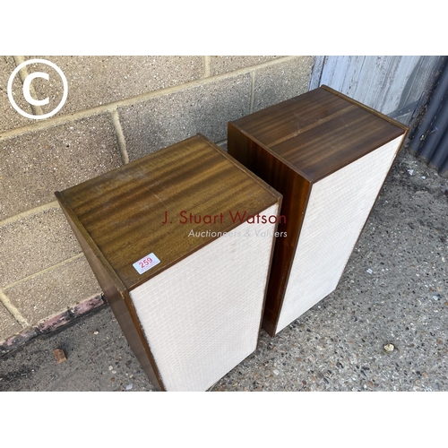 259 - A pair of teak cased stereo speakers