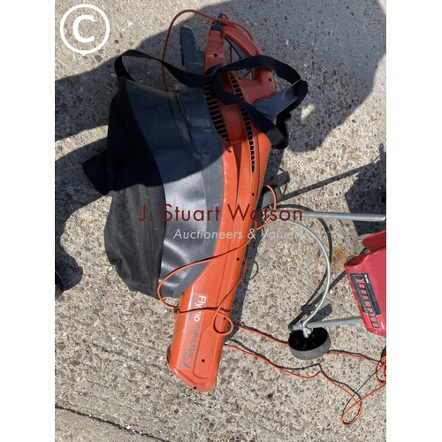 263 - A champion electric shredder and a Flymo leaf vac