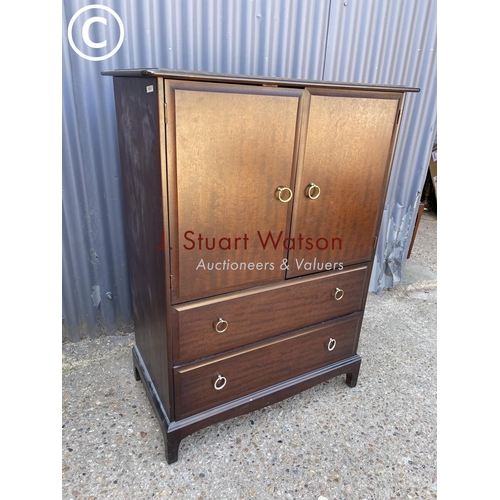 265 - A stag minstrel tallboy cupboard / chest