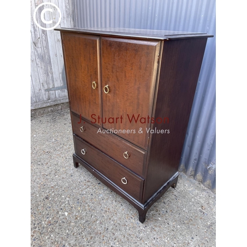 265 - A stag minstrel tallboy cupboard / chest