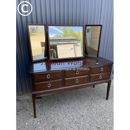 266 - A stag minstrel six drawer dressing chest