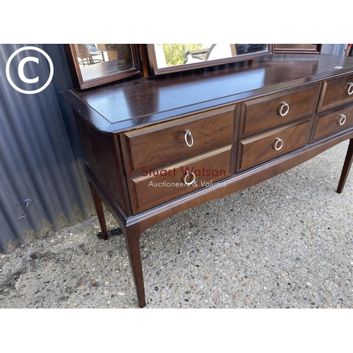 266 - A stag minstrel six drawer dressing chest