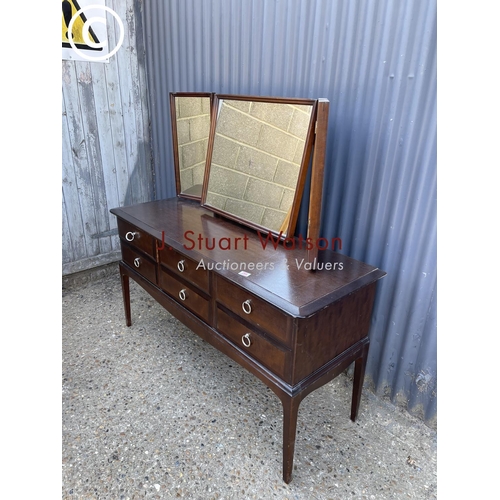 266 - A stag minstrel six drawer dressing chest