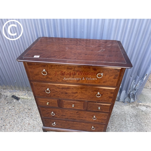 267 - A stag minstrel tallboy chest of 7 drawers