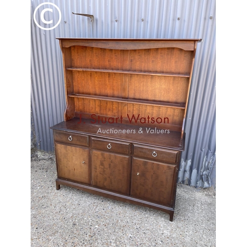 268 - A stag minstrel three drawer dresser