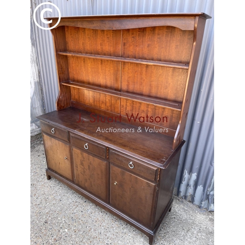 268 - A stag minstrel three drawer dresser