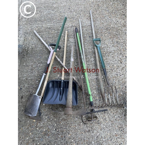 277 - Pick axe, snow shovel and garden tools