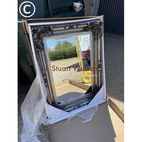 286 - A large silver gilt wall mirror 88x120:
