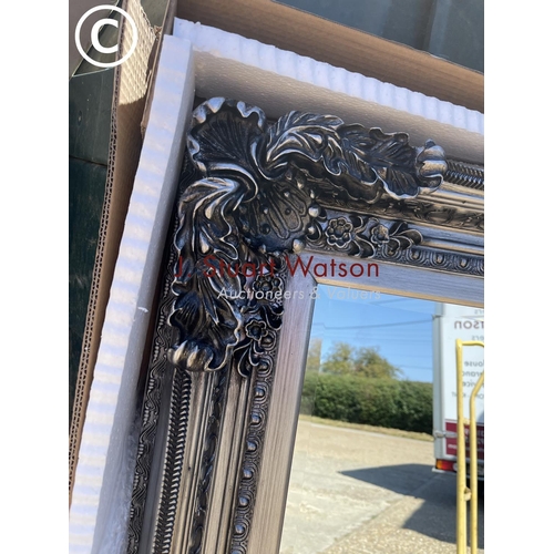 286 - A large silver gilt wall mirror 88x120: