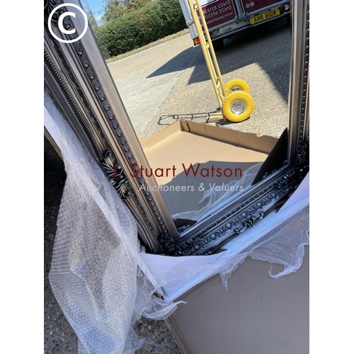 286 - A large silver gilt wall mirror 88x120: