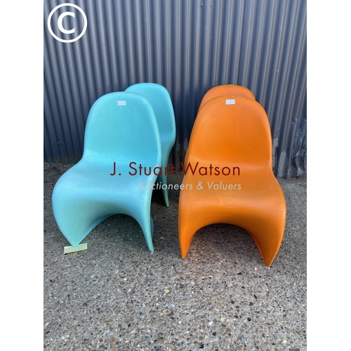 288 - A set of four Verner Panton designer chairs, two orange two blue