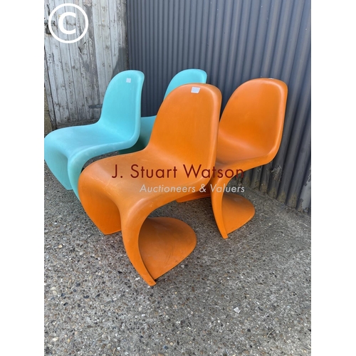 288 - A set of four Verner Panton designer chairs, two orange two blue