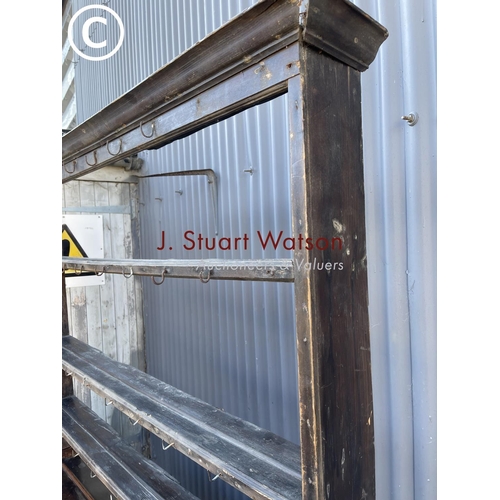 289 - An antique oak three drawer dresser base with later farmhouse style pine plate rack top 154cm wide