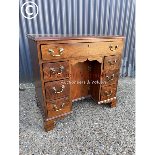 290 - A compact victorian mahogany kneehole desk 80x47x77