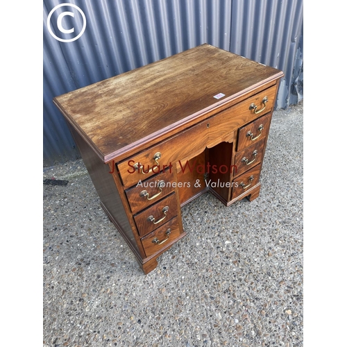 290 - A compact victorian mahogany kneehole desk 80x47x77
