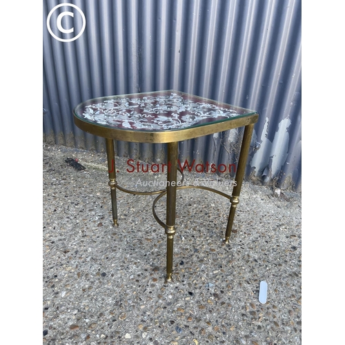 293 - A retro brass side table with embroidered top