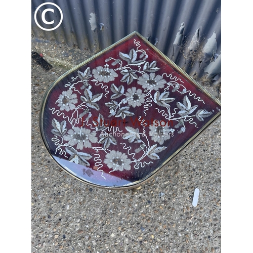 293 - A retro brass side table with embroidered top