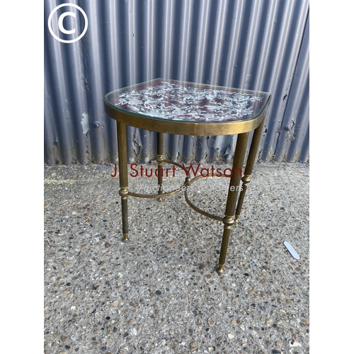 293 - A retro brass side table with embroidered top