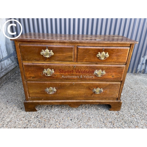 294 - An Edwardian chest of four drawers