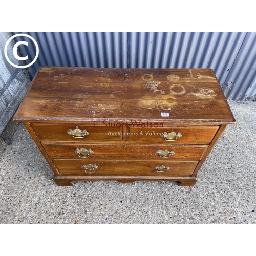 294 - An Edwardian chest of four drawers